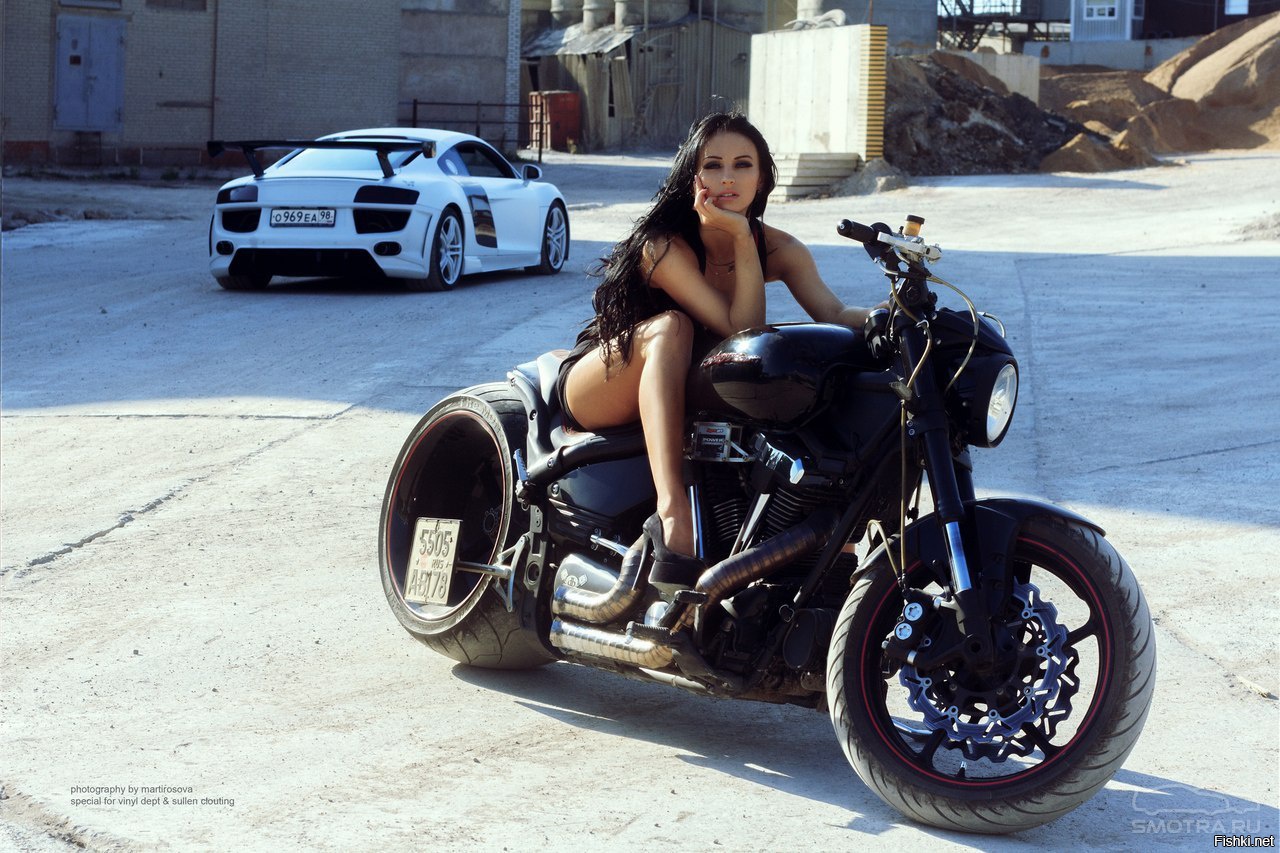 Sexy model Brunettes on a motorcycle in Kito